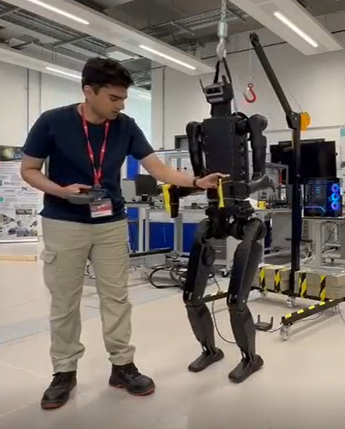 Rakshith piloting the Unitree H1-2 humanoid on its gantry